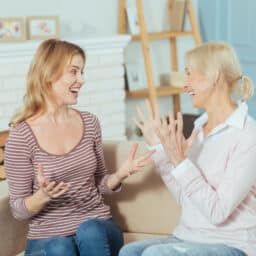 Happy mother and daughter chat