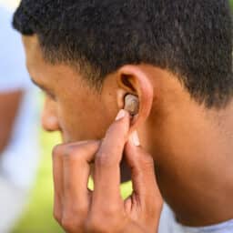 Man wearing an in-the-ear hearing aid